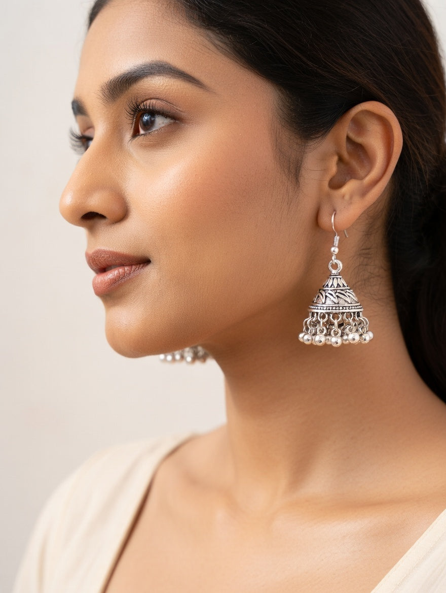 BoldCharm Silver Jhumka Earrings